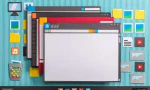 Papierowy pulpit z oknami, ikonami i paskiem zadań. Wygląda jak asystent aktualizacji Windows 11.