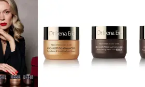 Elegancka kobieta prezentuje kosmetyki Dr Irena Eris z serii Rich Peptide Advanced.