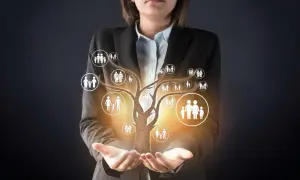 Arbre généalogique lumineux avec des icônes de familles, symbolisant myheritage fr.
