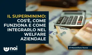 Il superminimo non assorbibile: cos'è, come funziona e come integrarlo nel welfare aziendale. Calcolatrice e banconote in primo piano.