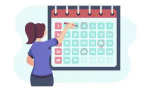 Donna segna sul calendario i turni di lavoro su 6 giorni, pianificando le giornate.