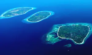 Gili Air och dess grannöar, frodiga och gröna, omgivna av turkost vatten. En drömresa till paradiset.