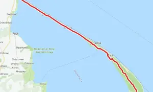 Mapa z zaznaczoną trasą rowerową od Władysławowa do Helu wzdłuż wybrzeża.