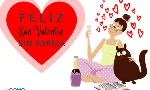 Feliz San Valentín sin pareja. Una mujer celebra con champán y su gato, rodeada de corazones.