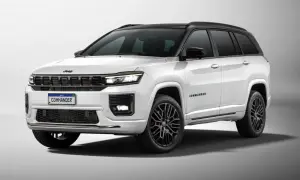 Biały Jeep Commander z czarnym dachem i przyciemnianymi szybami, na czarnych felgach. Limitowana edycja tego SUV-a prezentuje się imponująco.