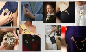Kolekcja broszek z kamieniami: motyl, wąż, pajęczyna, kwiat i inne ozdoby.