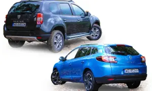 Niebieski Renault Megane Grandtour i czarny Dacia Duster stoją obok siebie na żwirowej drodze.