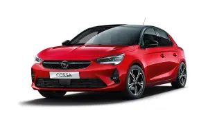 Röd Opel Corsa med svart tak. En snygg bil som kan ha opel corsa 1.2 vanliga fel, men ser bra ut på bild.