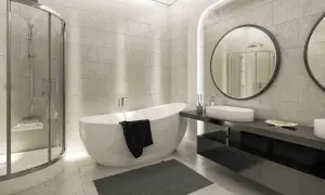Un moderno bagno cieco con vasca freestanding, doccia a nicchia e doppio lavabo. L'ambiente è elegante e minimalista.