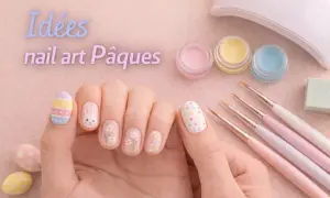 Idées nail art Pâques : un lapin mignon, des fleurs délicates et des œufs colorés ornent ces mains pour célébrer la saison.