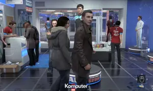 W sklepie z androidami, gdzie można sprawdzić wymagania Detroit Become Human, klienci oglądają modele i promocje.