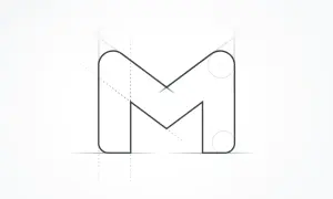Nowa ikona Google, litera M, z pomocniczymi liniami i okręgami, sugerująca proces projektowania.