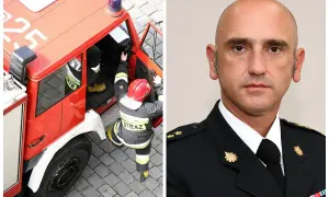 Brygadier K. Gielsa w mundurze, obok niego strażak wsiada do wozu strażackiego.