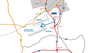 Mapa lotniska w Berlinie Brandenburg BER z terminalami 1 i 2, parkingiem McParking oraz drogami dojazdowymi A113, B96a.