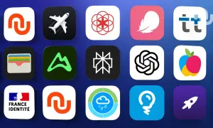 Grille d'icônes d'applications, incluant un avion, un portefeuille, un logo de montagne, et des symboles abstraits. Une mise à jour des applications est en cours.