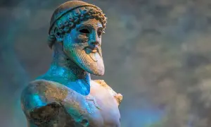 Buste en bronze d'un cyclope, peut-être Ulysse, avec une barbe et une coiffe.