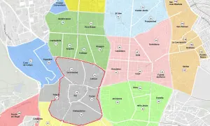 Mapa de Madrid con zonas de colores que ilustran la diferencia entre zona azul y zona verde, mostrando barrios como Sol, Embajadores y Cortes.