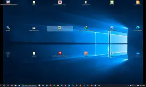 Pulpit Windows 11 z ikonami. Dowiedz się, jak zmniejszyć ikony na pulpicie Windows 11, aby uzyskać bardziej uporządkowany wygląd.