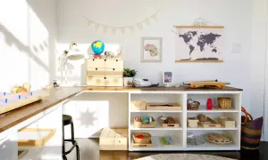 Inspiring Montessori shelf ideas for a child's learning space, featuring a globe, animal figures, and organized trays of educational materials.