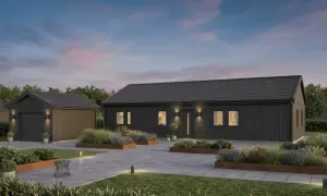 Modern dark gray house and detached garage with landscaped garden beds and paved driveway at dusk.