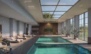 Ein luxuriöser Poolbereich mit Liegen und Pflanzen. Perfekt für einen geheimtipp urlaub november deutschland.