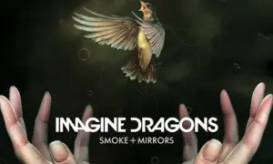 Ptak w locie nad dłońmi, z napisem "IMAGINE DRAGONS SMOKE + MIRRORS".