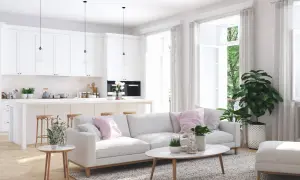 Illuminazione perfetta per un abbinamento lampadari open space: tre pendenti moderni sopra l'isola cucina e un'atmosfera accogliente nel soggiorno.