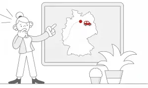 Kobieta planuje podróż po Niemczech, wskazując na mapę. Może to być związane z planowaniem trasy lub sprawdzaniem, gdzie znajdują się niemieckie tablice rejestracyjne.