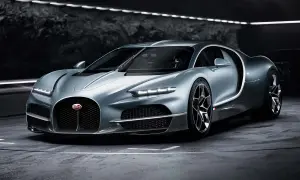 Srebrny Bugatti Tourbillon, symbol luksusu i mocy, prezentuje swoje aerodynamiczne linie w mrocznym wnętrzu.