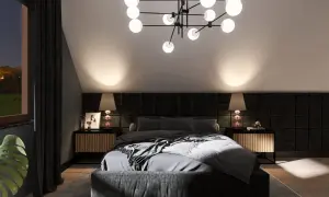 Nowoczesna sypialnia z łóżkiem i lampkami nocnymi, przypominająca wnętrze w stylu zamkowym.