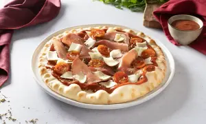 Pizza jambon cru parfaite : le secret pour une saveur intacte