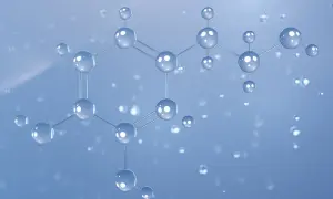 Molekularna struktura, która może być powiązana z tym, co to cetearyl alcohol. Błyszczące kuleczki połączone pręcikami na niebieskim tle.