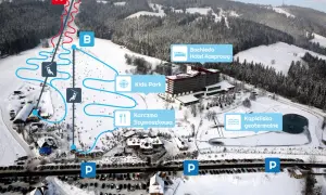 Widok z lotu ptaka na stację narciarską Suche z trasami, wyciągami, hotelem Bachleda, karczmą i basenem geotermalnym.