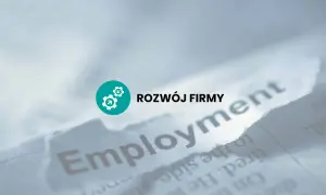 Rozwój firmy i prawa pracodawcy. Słowo "Employment" na podartym papierze.
