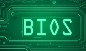 Zielony schemat obwodu drukowanego z napisem BIOS. Dowiedz się, jak zaktualizować BIOS, aby poprawić wydajność komputera.