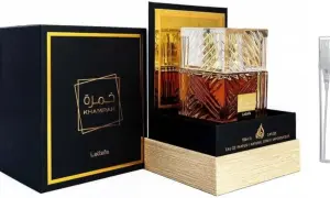 Eleganckie opakowanie i flakonik perfum Lattafa Khamrah. Złote zdobienia i ciemna kolorystyka podkreślają luksusowy charakter.