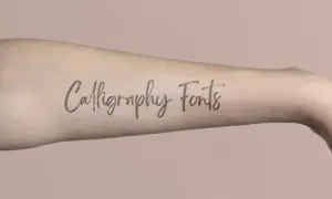 Ramię z napisem "Calligraphy Fonts" - inspiracja dla najładniejszych czcionek na tatuaż.