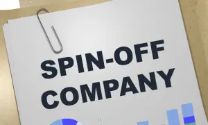 Dokument z nagłówkiem "SPIN-OFF COMPANY" i wykresami, sugerujący nowy projekt lub strategię.