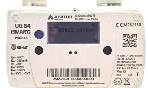 Biały licznik gazu Apator iSMARTz z wyświetlaczem pokazującym stan licznika i kodem QR.
