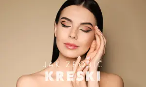 Kobieta z perfekcyjną kreską eyelinerem na oku, delikatnie dotyka twarzy.