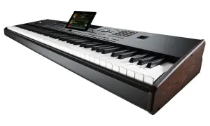 Czarny keyboard marki Korg, japońskiego producenta instrumentów muzycznych, z drewnianymi bokami i dotykowym ekranem.