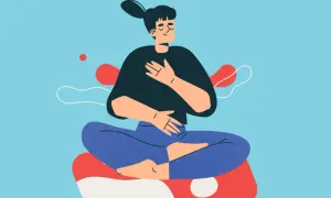 En person sitter i lotusställning med slutna ögon och händerna på bröstet och magen, en illustration som visar hur man kan lugna nervsystemet.