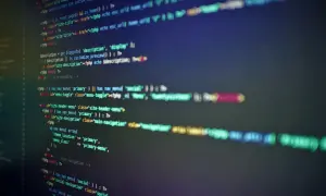 Kod w języku PHP, tworzący nawigację strony. Widać fragmenty kodu odpowiedzialne za menu i jego wyświetlanie.