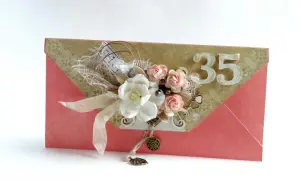 Koperta z ozdobami kwiatowymi i cyframi "35" na białym tle.