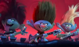 Trzy trolle rockmani grają na gitarach, tworząc energetyczne trolle piosenki.