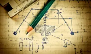 Szkic mechanizmu z ołówkiem i linijką. Może to być projekt urządzenia, na które firma ma wyłączne prawo do produkcji.