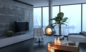 Nowoczesny salon z kominkiem i widokiem na mglisty krajobraz. Czy tak wyglądają domy pasywne co to?