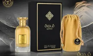 Eleganckie arabskie odpowiedniki perfum Qidwah: flakon, czarne pudełko i złoty woreczek.