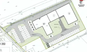 Projekt zagospodarowania terenu pod dom wielorodzinny z parkingiem, placem zabaw i drogą pożarową.