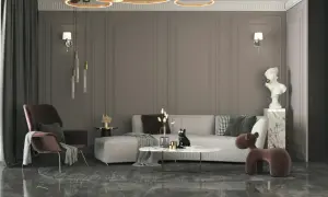 Nowoczesny salon z szarą kanapą, designerskim fotelem i okrągłym stolikiem. Elegancki styl wnętrz podkreślają złote lampy i marmurowe detale.